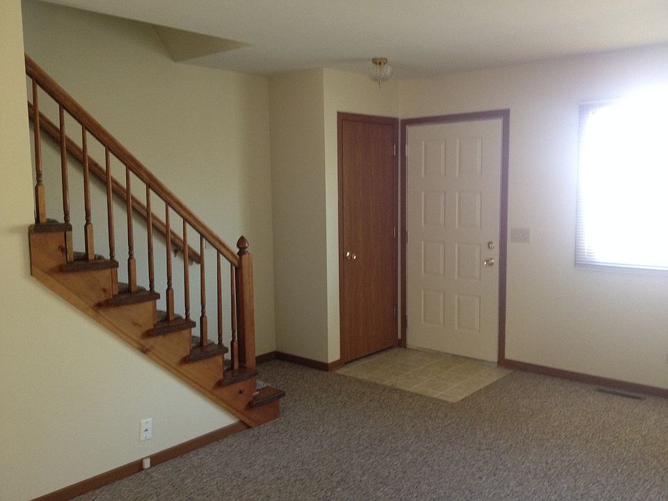 Front door and closet - Stairway to the second floor.