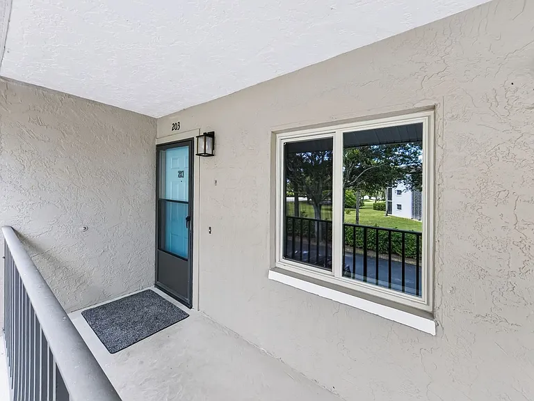 5693 Rattlesnake Hammock Rd #203 — Photo 33