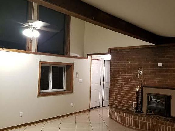Huge living room is open  to dining area. Open concept livin