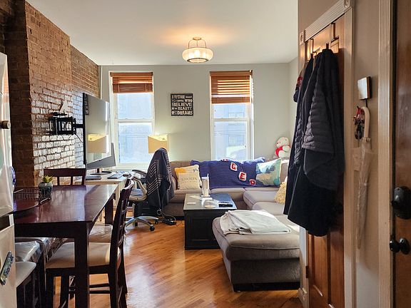 Beautiful Open Concept with Kitchen, Living Room, and Dining Area with pantry closet for storage!