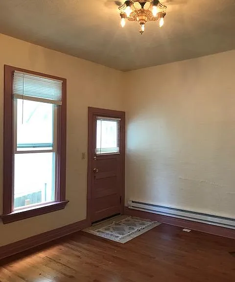 High ceilings, and original vintage light fixture-