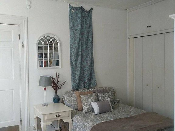 Small area for bed in front of the closet