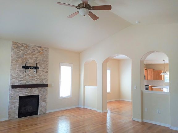Great room looking into the dining room and kitchen