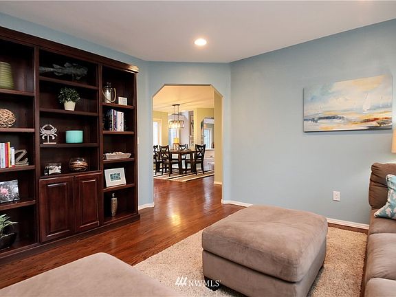The family room is centrally located off the kitchen and dining area.
