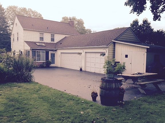 3-Car garage and tool sheds