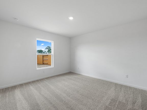 A private master retreat with lush carpet