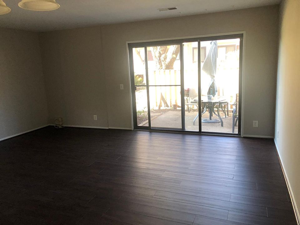 Living room with Patio view