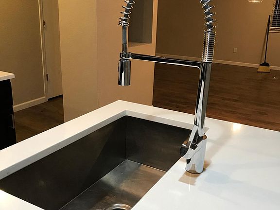 Industrial sink with quartz countertops