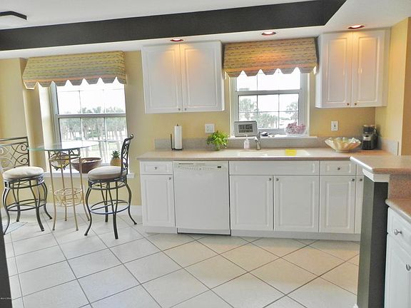 5th image of 4650 Links Village Dr Unit A404
