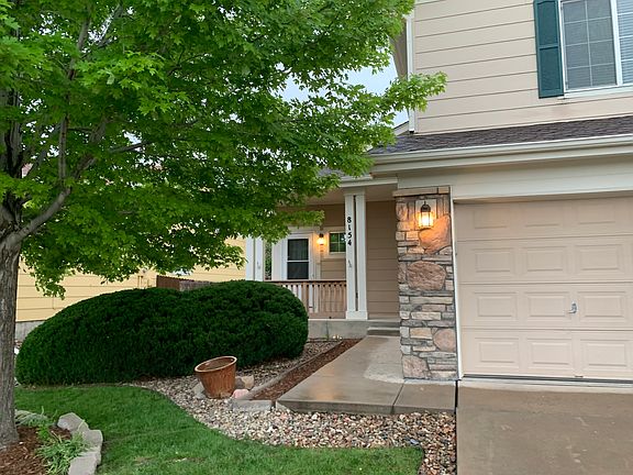 Water sprinklers and landscaped front/back yard.