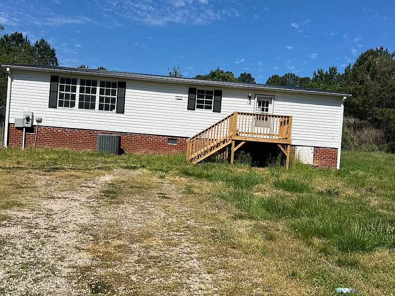 128 Reginald Russell Rd — Photo 1
