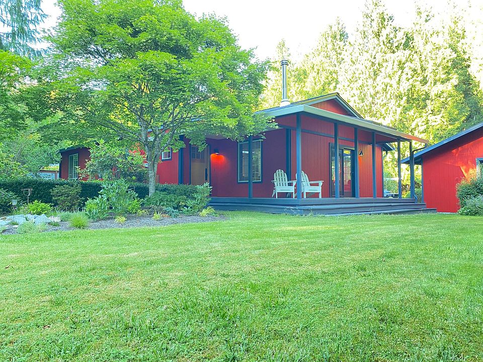 With just over an acre, this sturdy little home is surrounded by trees but sits in an opening that gets great sun all day so you can thaw as desired.