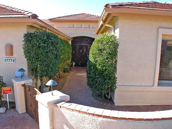 Front Patio with Brick Pavers &amp; Pony Wall