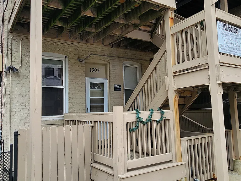 Apartment rear entrance and porch
