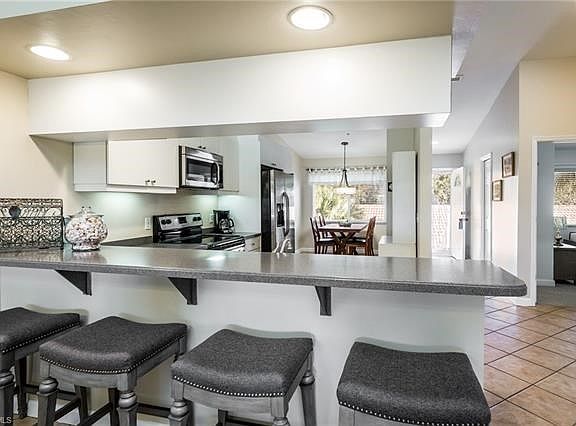 5th image of 6670 Beach Resort Dr APT 14