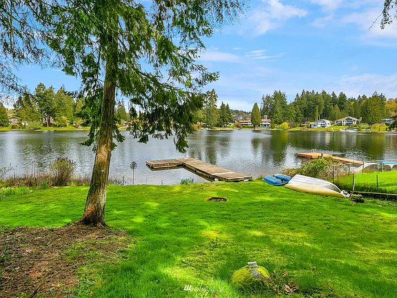 The view from the home site. Enjoy the current cottage house or build your dream house.   Close to schools and shopping>