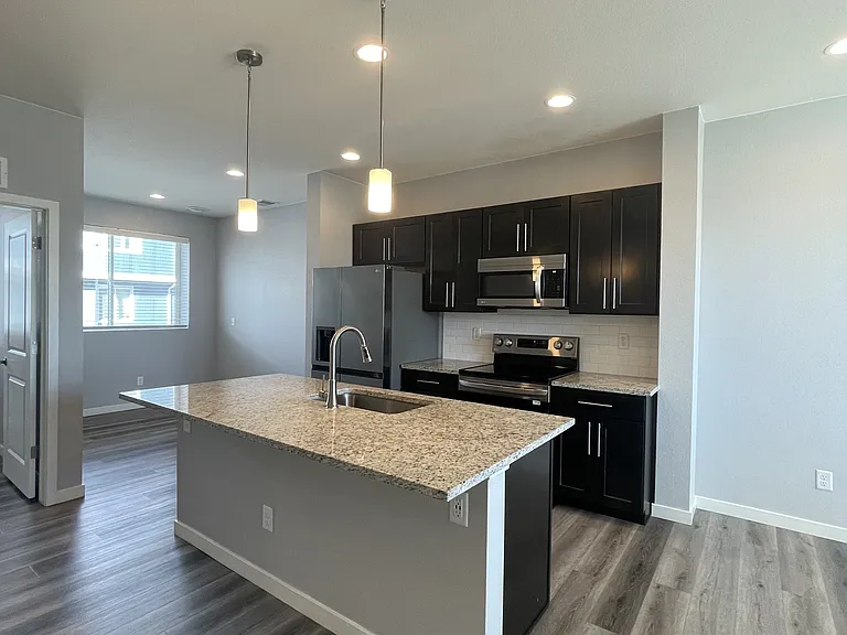 The Rowhomes at Greyhound Park — Photo 26