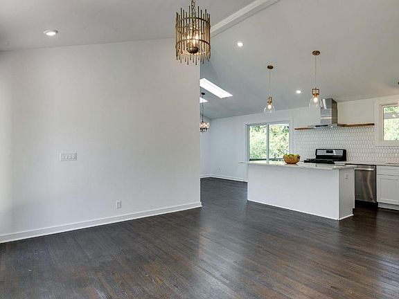 living room, kitchen and dining room view.