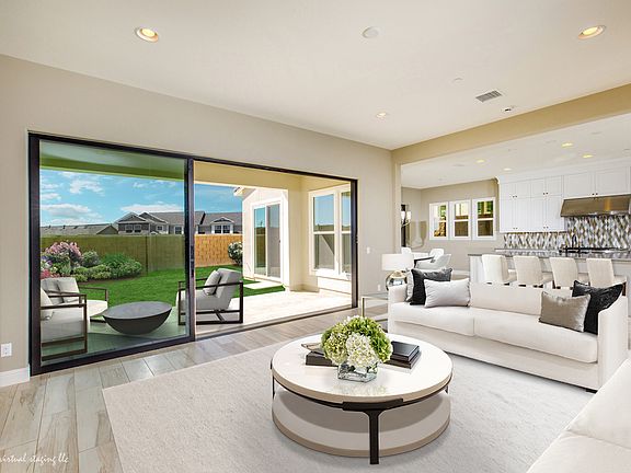 Enjoy indoor/outdoor living in this open-concept floor plan.