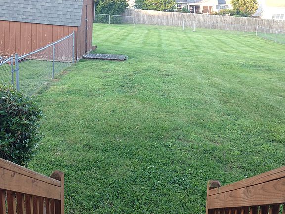 Backyard with split storage shed