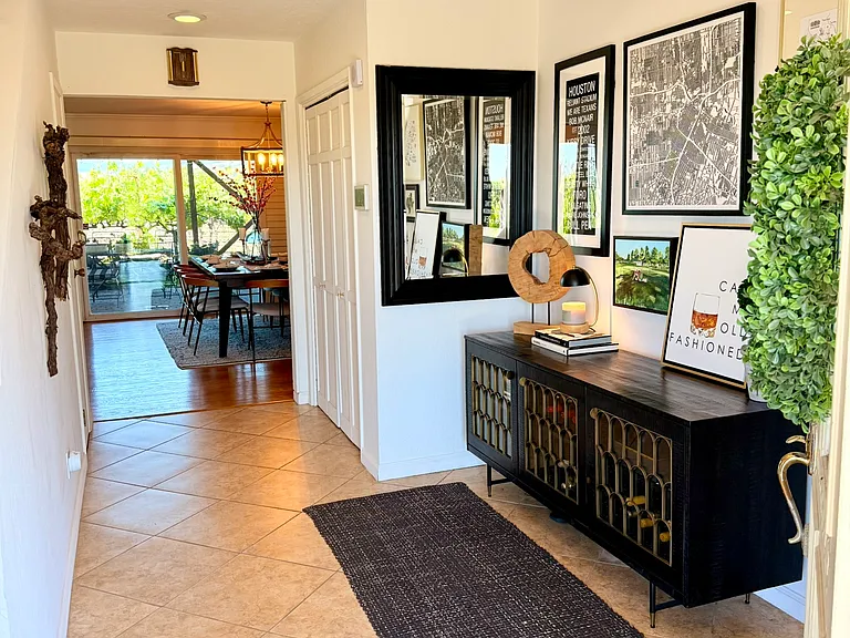 Entry hall leading to kitchen and dining area.