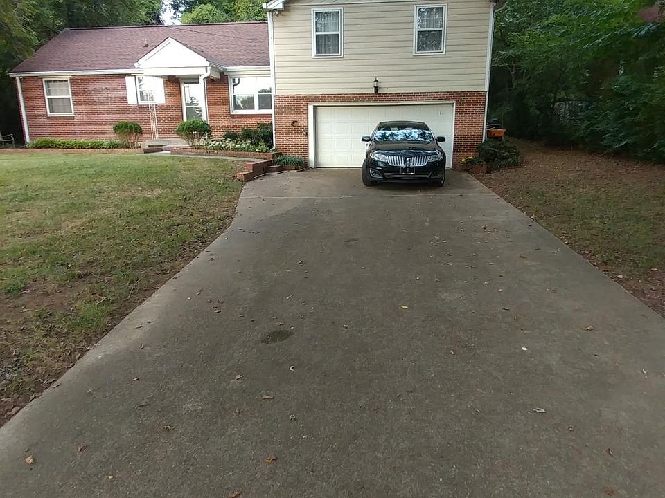Large driveway with 2 car garage...plenty of parking room!