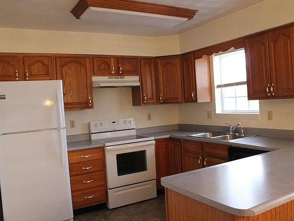 Kitchen, has been updated with larger frig and stainless steel appliances