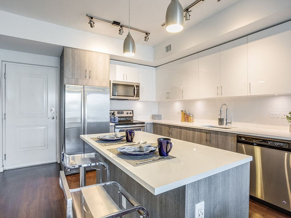 Stainless steel appliances and quartz countertops