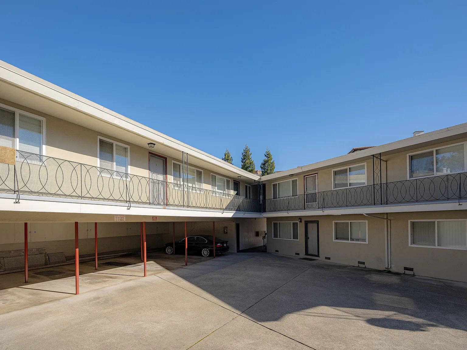 Experience the serenity of sunlit courtyard living in these delightful two-story apartments.