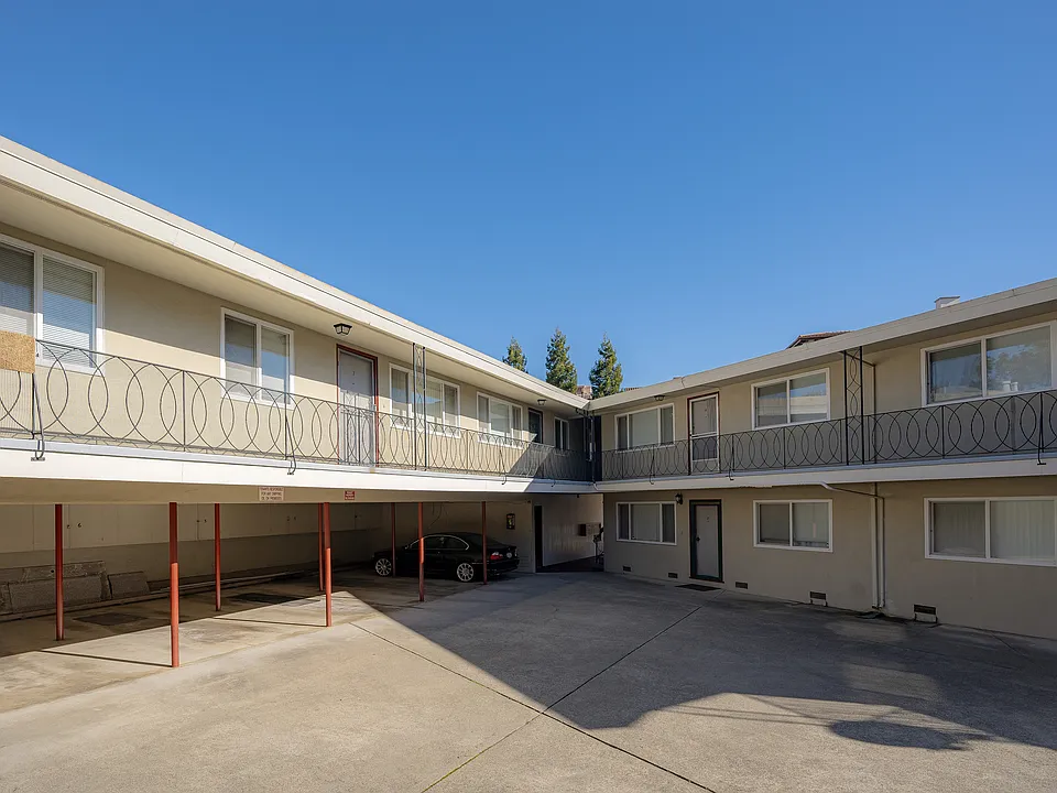 Experience the serenity of sunlit courtyard living in these delightful two-story apartments.