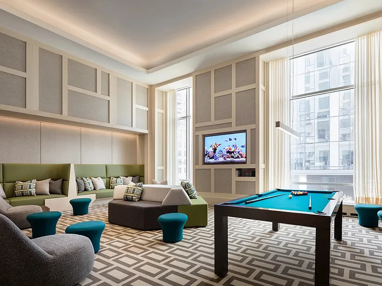 Recreation room complete with a pool table, gaming and lounge area.