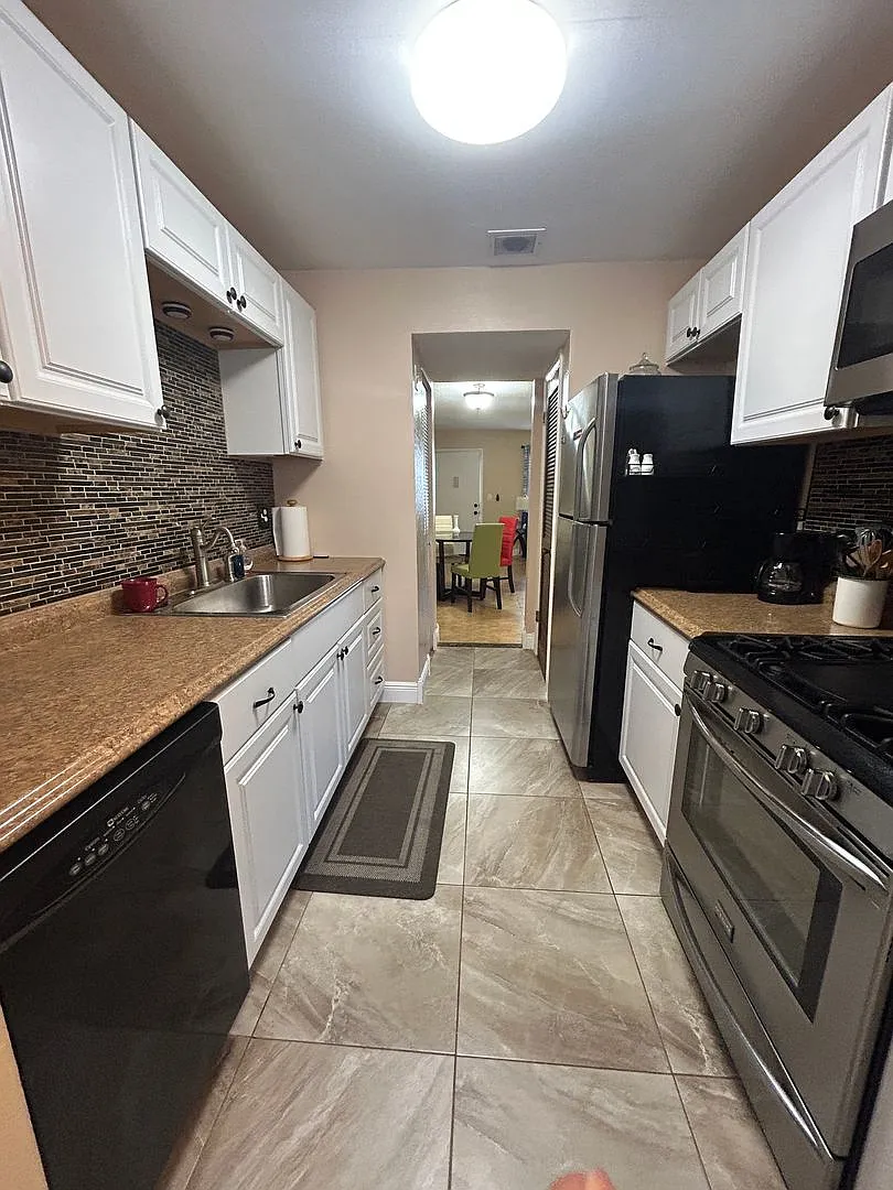 Coastal Living Awaits Stylish Condo Near the Beach! — Photo 3