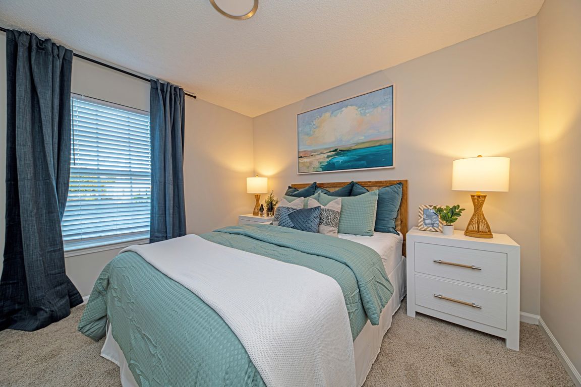 Bedroom with carpet