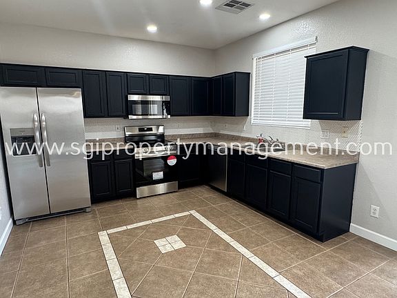 3rd image of 1909 N 103rd Ln