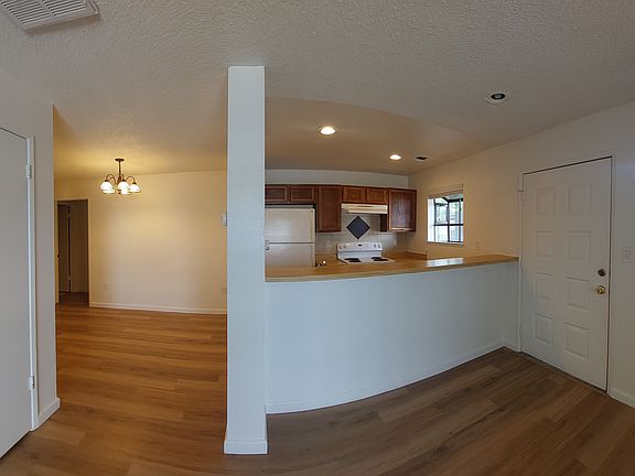 Open living areas with recent updates provides a comfortable living space. LVP or tile flooring throughout.