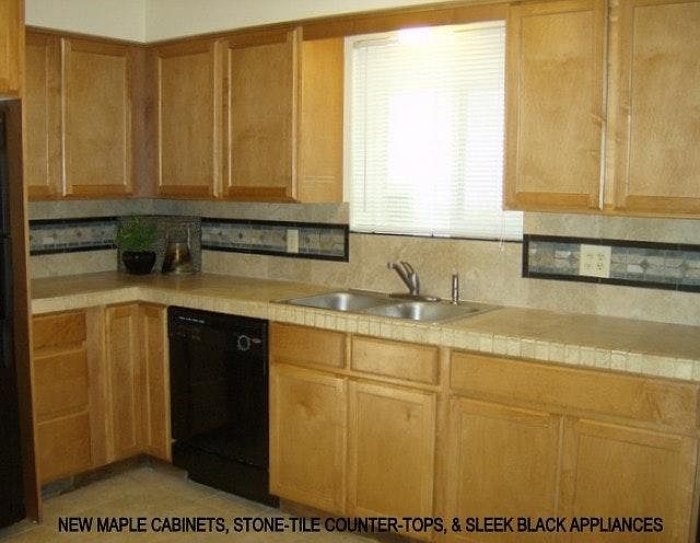 Maple cabinets & stone counters