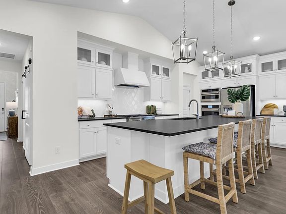 Kitchen with upper glass cabinets