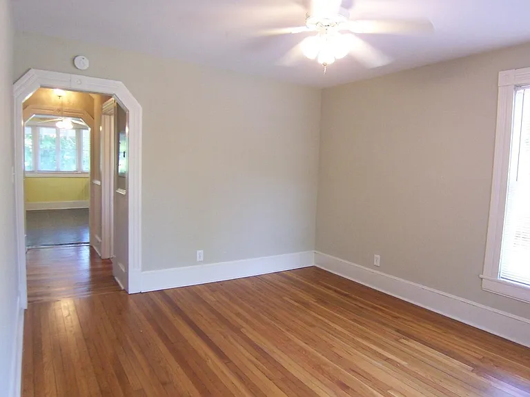 Living room looking down hall toward kitchen