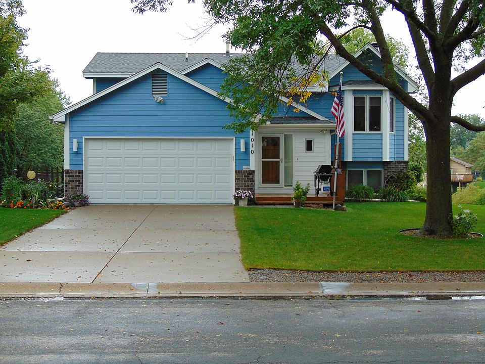 Immaculate yard and gardens.
South facing concrete driveway is a must have in MN if you don't want snow and ice build up.  Exterior painted with the best  July 2019.