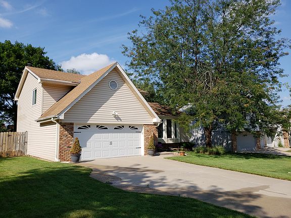 Front, left of driveway