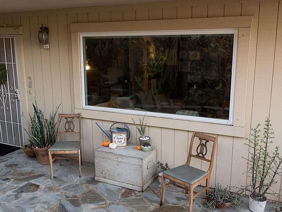 large paved front patio