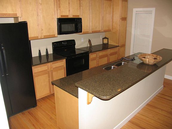 Kitchen with grannite countertops--all appliances stay!