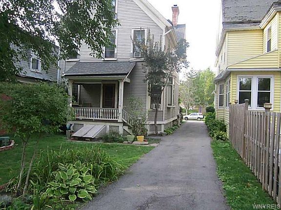 View from the back with back open area - also view of the back unit entrance
