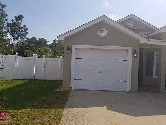 Left side yard with fence