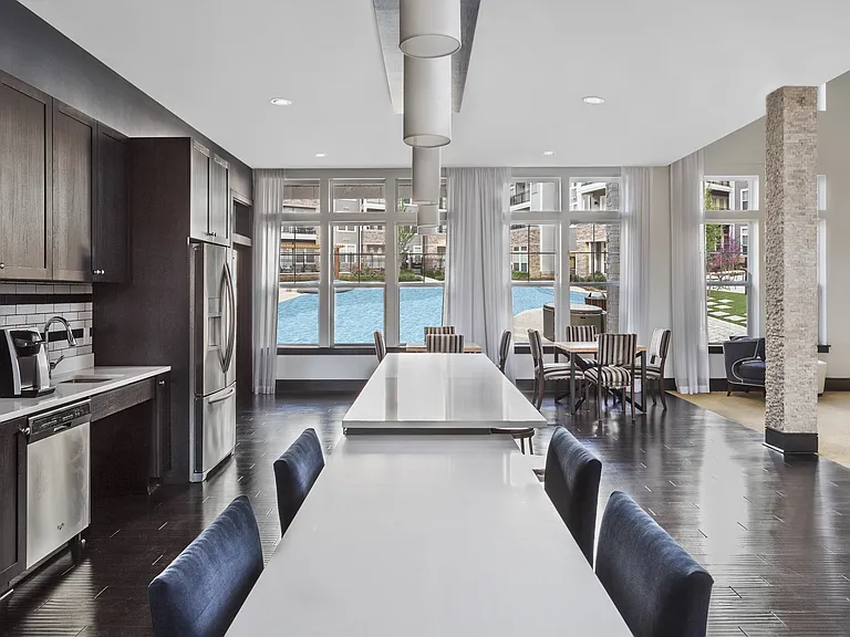 Modern Resident Lounge with Bar and Communal Tables