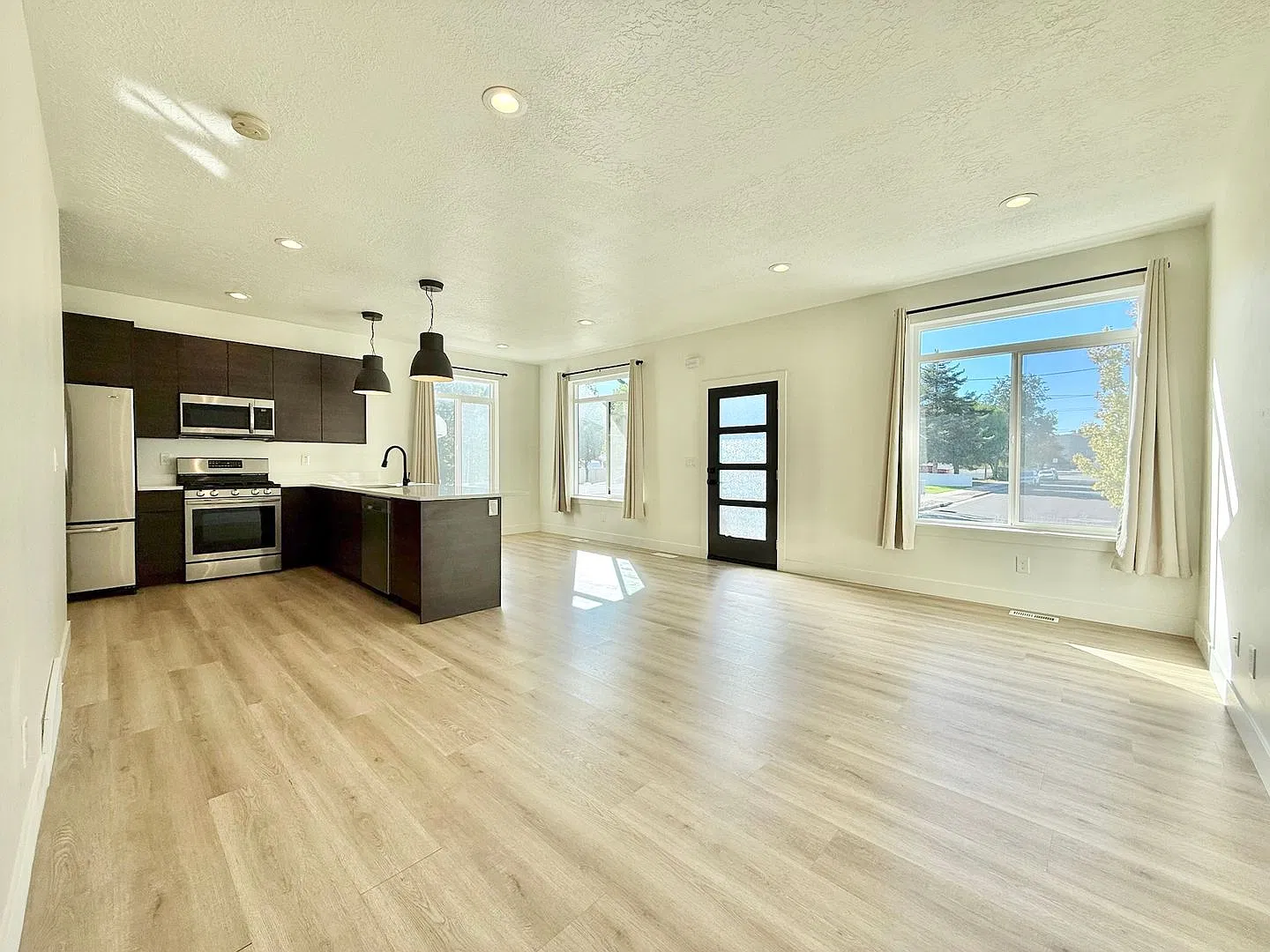 4-Bedroom Midvale Townhome | Garage + Pets Allowed + Great Location — Photo 4
