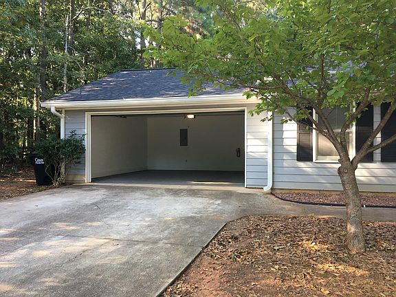 Large 2 car garage with new garage door.