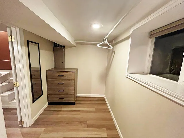 Walk-in closet connected to bedroom #3
