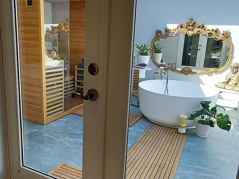Draw the privacy shades, or swing open the French doors for an "inside outside" feel