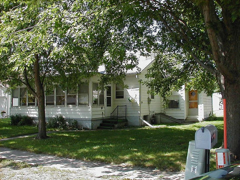 Front of house w/sunroom